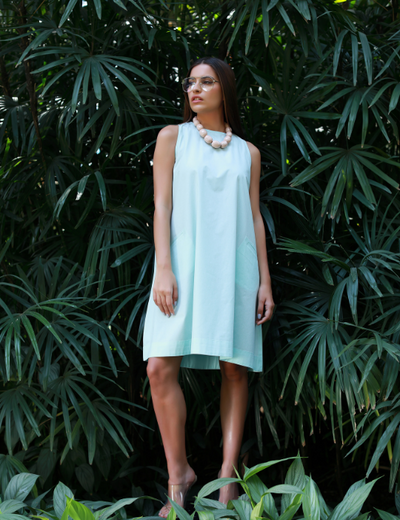 Front View Of Tiara Mint Sun Dress in the garden